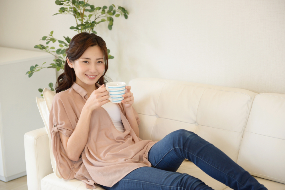 a woman having tea